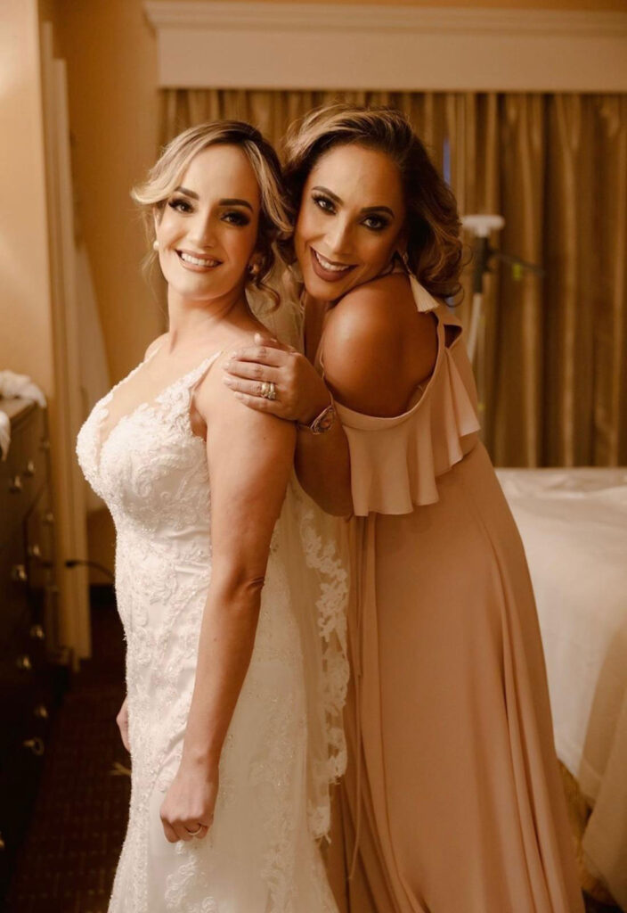 Orlando bride and maid of honor in wedding attire.