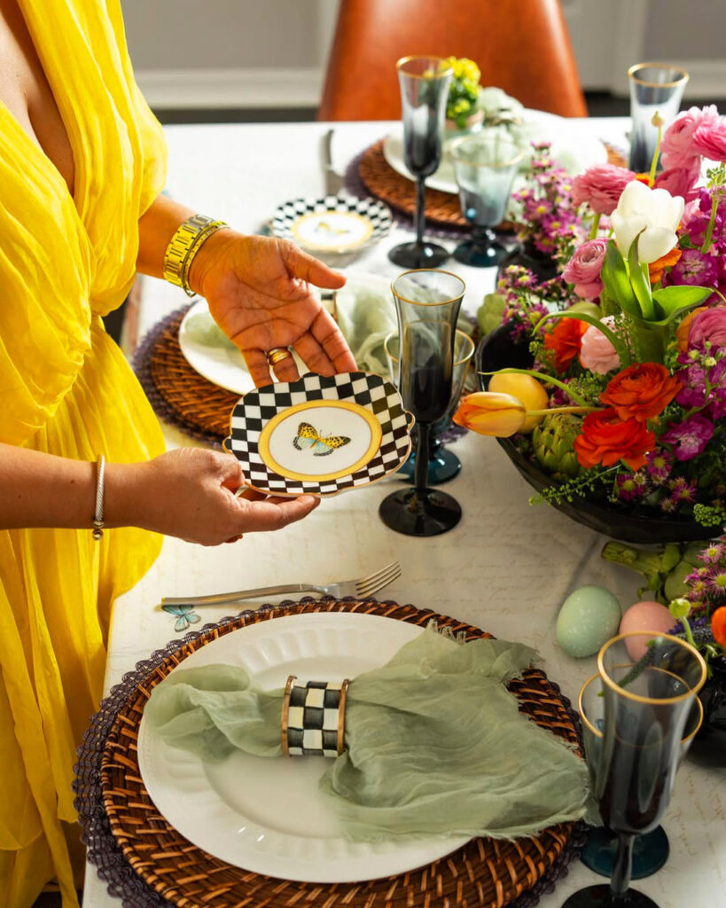 Spring table setting featuring a butterfly-decorated plate.